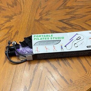 Portable Pilates Studio with Purple and Black Accessories